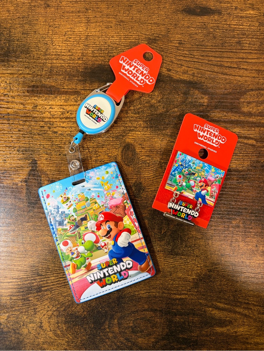 Universal Studios Hollywood Super Nintendo World Badge ID Holder With Reel & Pin